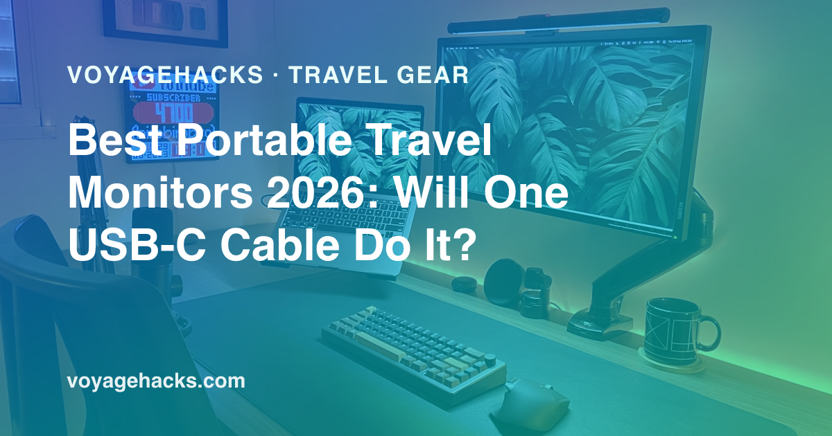 A portable monitor set up next to a laptop on a desk away from home